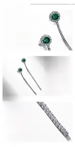 Detailed view of S925 sterling silver long fringe earrings with lab emeralds
