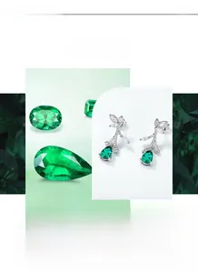 Detail of S925 silver floral earrings featuring pear-cut emerald and white zircon leaves