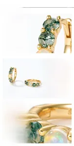 Macro shot of S925 silver earring with green moss agate, opal, and gold plating