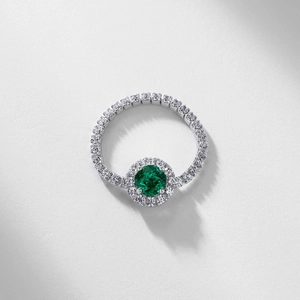 S925 sterling silver halo ring featuring a round emerald center and paved zircons