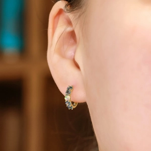 Elegant S925 silver hoop earrings with opal and moss agate stones on a female ear
