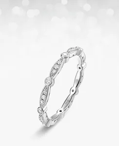 Macro shot of S925 sterling silver ring band with S925 hallmark and prong-set moissanite