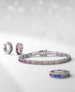 Macro shot of S925 sterling silver jewelry set featuring gradient rainbow zircon stones