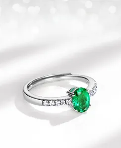 Macro detail of S925 hallmark on silver adjustable lab-grown emerald ring band