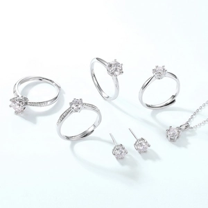 Elegant S925 sterling silver jewelry set featuring moissanite necklace and adjustable rings
