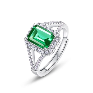 Classic S925 silver halo ring featuring 1.25ct emerald cut green gemstone with split shank