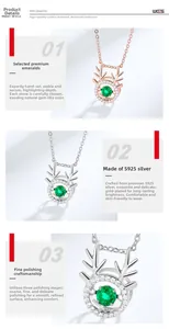 Detail of S925 silver deer antler pendant with green emerald and pave setting diamonds