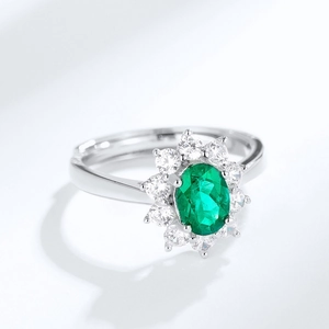 Elegant S925 silver ring featuring an oval emerald center stone and diamond halo