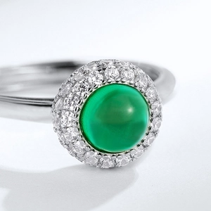 Elegant S925 silver ring featuring a large oval emerald gemstone with halo diamonds