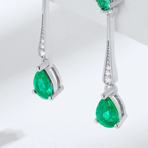 Elegant S925 silver threader earrings with pear-cut emerald stones and white diamonds