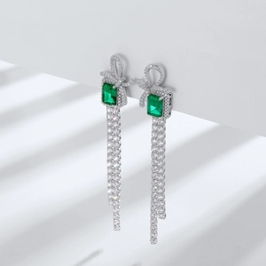 S925 silver bow earrings with emerald gemstone and long dangling diamond tassels