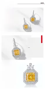 Détail de boucles d'oreilles en diamant carbone jaune taille coussin avec halo en argent S925