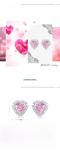Vue macro de boucles d'oreilles cœur en argent 925 avec diamants roses en carbone