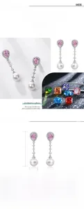 Detail view of S925 silver earrings with pink pear-cut stone and white shell pearl