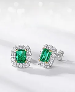 Macro shot of S925 sterling silver stamp and emerald-cut green gemstone on earring