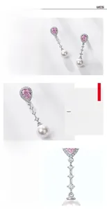Detailed view of S925 silver drop earrings with pink carbon diamonds and white pearls