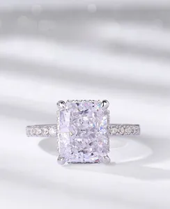 Detail of radiant ice-cut rectangular carbon diamond ring with micro-pave setting