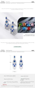 Detailed macro view of S925 silver drop earrings featuring blue pear-cut high carbon diamonds