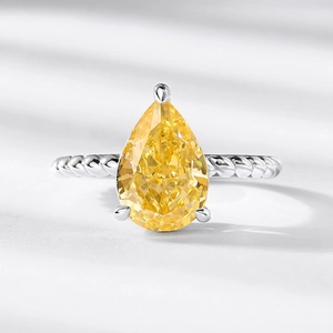S925 silver pear cut yellow carbon diamond ring with twisted band and luxury finish