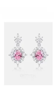 Close-up of pink oval high carbon diamond stud earrings in S925 sterling silver flower design