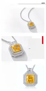 Détail du pendentif en diamant carbone jaune avec monture en argent S925 et serti micro-pavé