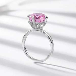 S925 sterling silver crown ring with a large pink round faceted gemstone centerpiece