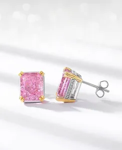 Detailed macro view of pink radiant cut carbon diamond earrings with ice flower facets