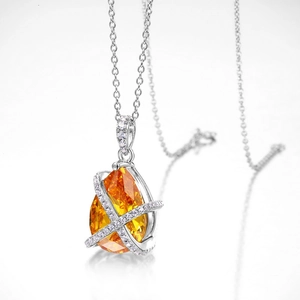 Luxurious S925 silver necklace with pear-shaped orange gemstone and micro-pave diamonds