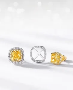 Macro detail of yellow ice-cut cushion diamond earrings in S925 sterling silver halo setting