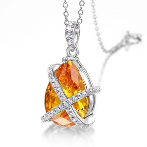 Luxurious S925 silver necklace featuring a pear-cut yellow gemstone with X-shaped diamond halo