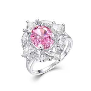 Elegant S925 silver ring featuring pink oval gemstone and floral crystal cluster