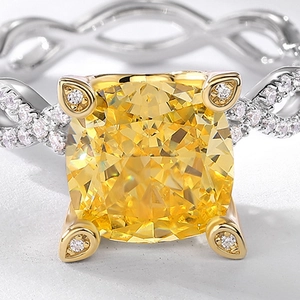 Elegant S925 silver ring with yellow square-cut gemstone and infinity twisted band