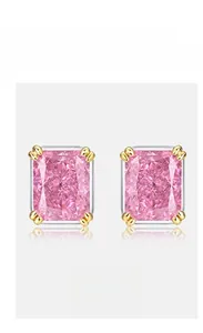 Macro shot of Radiant-cut pink high-carbon diamond earrings with four-prong settings