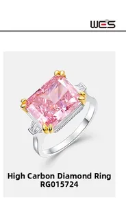 Detail of radiant cut pink high carbon diamond ring with baguette side stones