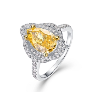 Bague de luxe en argent S925 avec une grande pierre jaune taille poire et halo de diamants