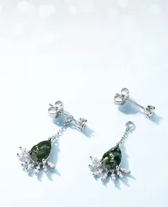 Detail of detachable S925 silver earrings featuring green moss agate and marquise zircon