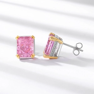 Pink rectangular carbon diamond studs with gold claw settings and silver base details
