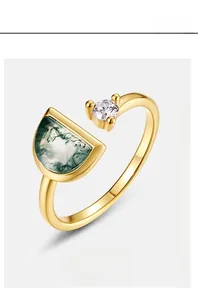Detailed view of S925 silver gold-plated ring with natural green moss agate and white zircon