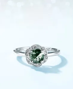 Detail showing S925 silver flower ring with green moss agate and sparkling petals