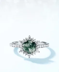 Macro view of geometric green moss agate ring with halo diamonds on S925 silver band