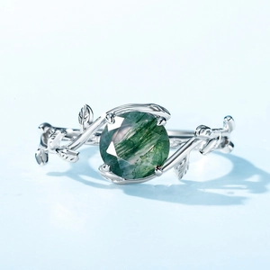 S925 silver moss agate ring featuring adjustable vine and leaf design on blue background