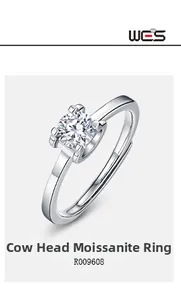 Macro shot of S925 sterling silver moissanite ring with classic bull head four-prong setting