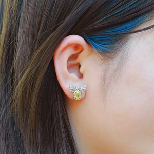 S925 silver bee stud earrings with yellow carbon diamond and white crystals on ear