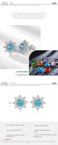Vue détaillée des boucles d'oreilles flocon en argent S925 avec diamants bleus de 6mm