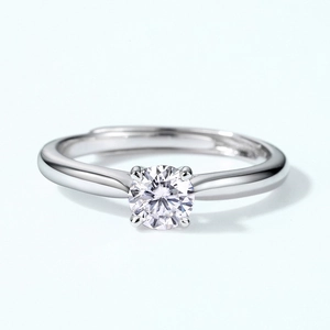 Elegant S925 sterling silver moissanite ring with a classic four-prong setting and open band