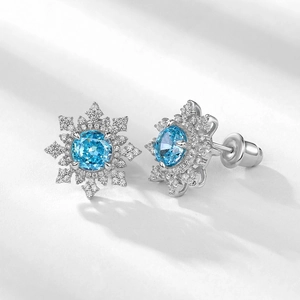 Boucles d'oreilles flocon en argent S925 avec pierre bleu clair et accents blancs