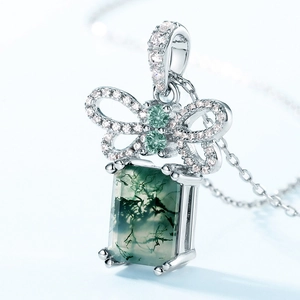 S925 silver moss agate pendant with a sparkling bow design and green gemstone accents