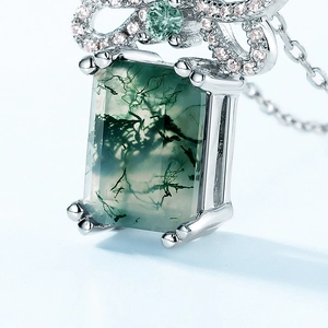 Elegant S925 silver necklace pendant with green moss agate and sparkling bow detail