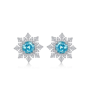 Élégantes boucles d'oreilles flocon en argent S925 avec pierre bleue coupe glace centrale