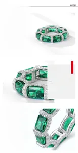 Detail view of emerald cut green gemstone ring with S925 silver setting and claw design